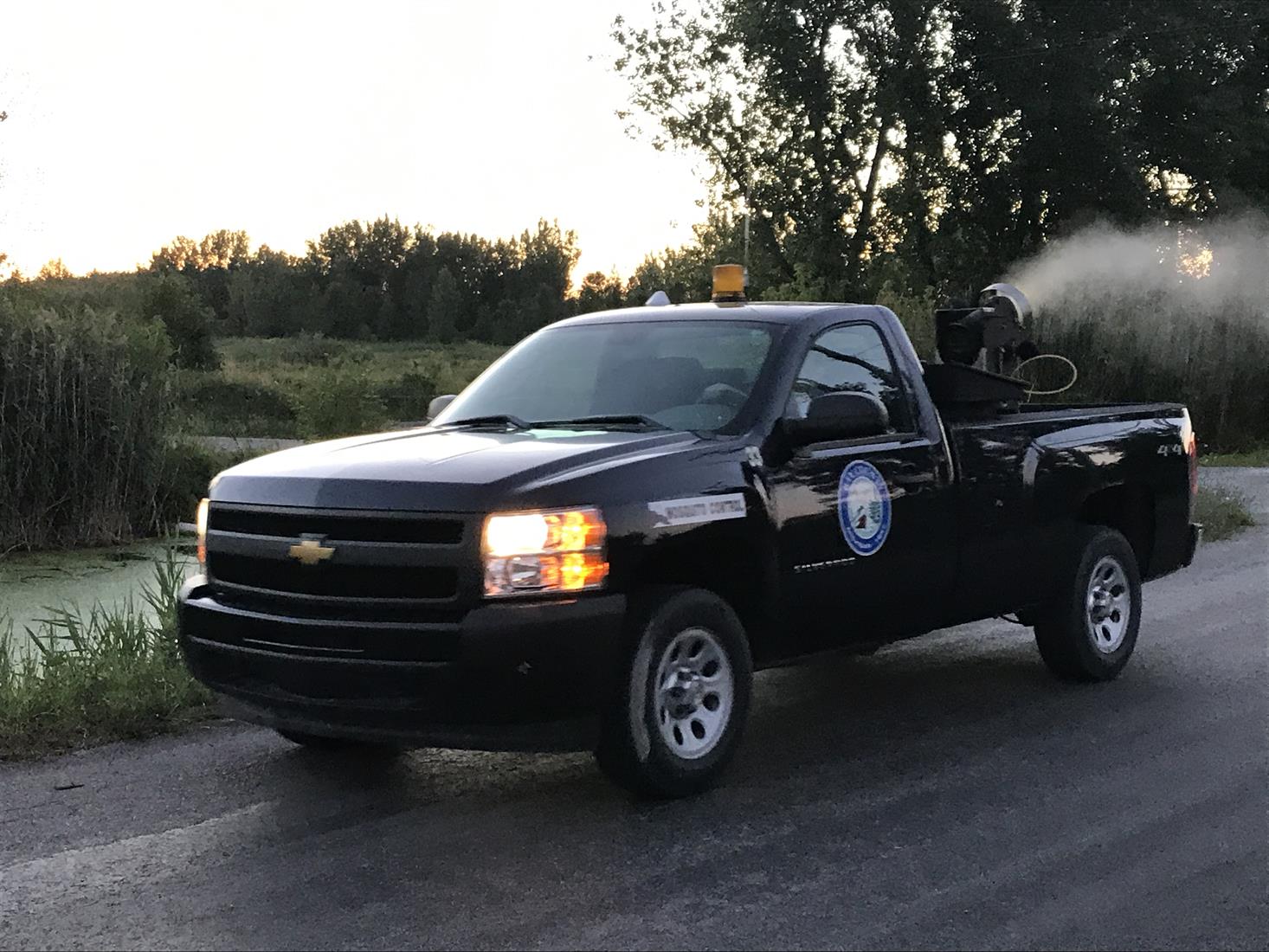 Mosquito Control truck for night-time fogging.